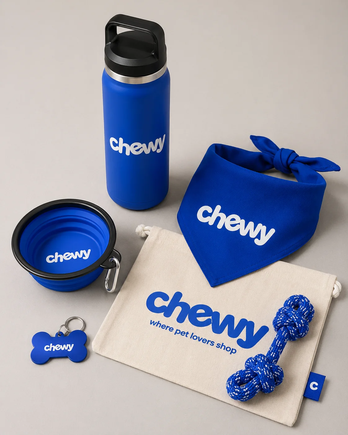 Chewy branded merch by Better Swag: bottle, bandana, collapsible bowl, rope toy, tag and tote